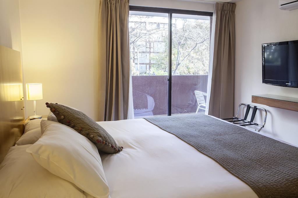 Apartahotel Time - Essential Santiago de Chile