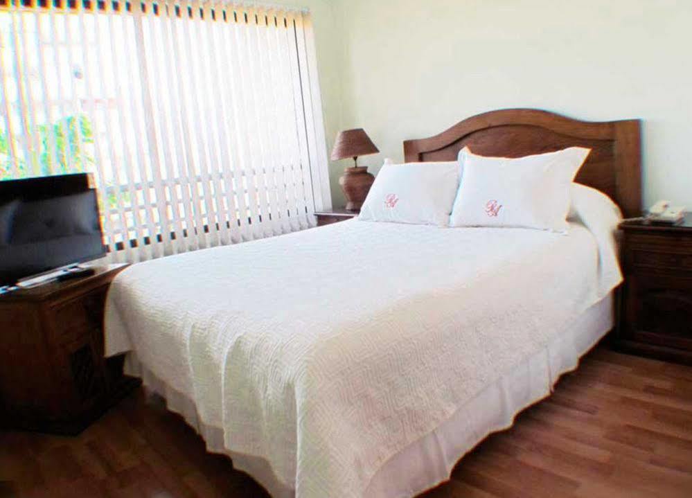 Roomapart Escuela Militar Apartahotel