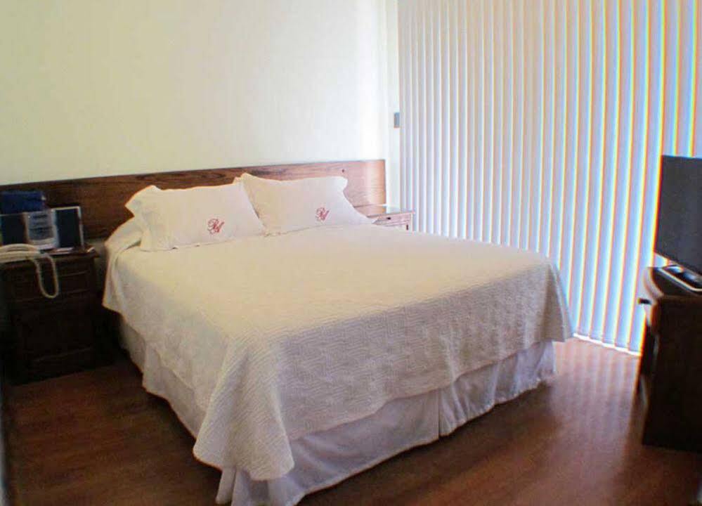 Apartahotel Roomapart Escuela Militar Santiago de Chile